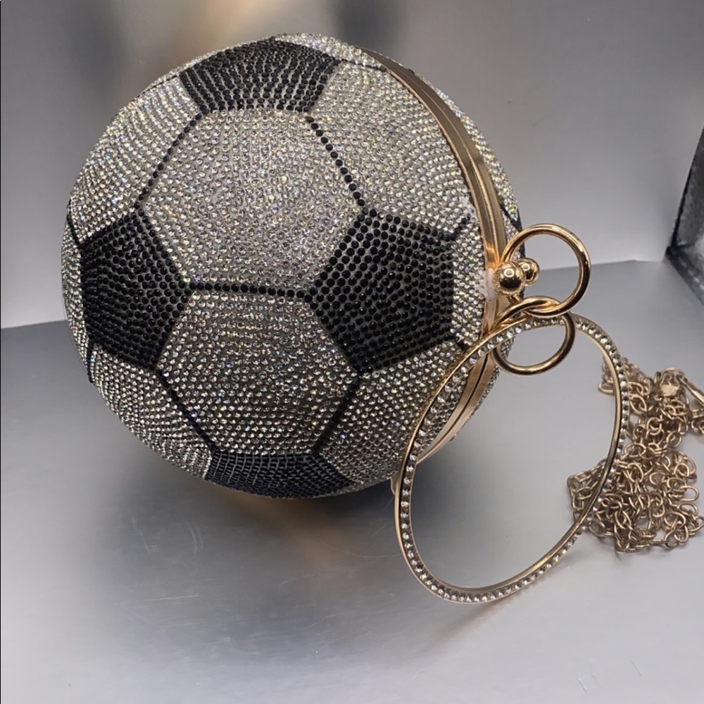 Soccer ball clutch